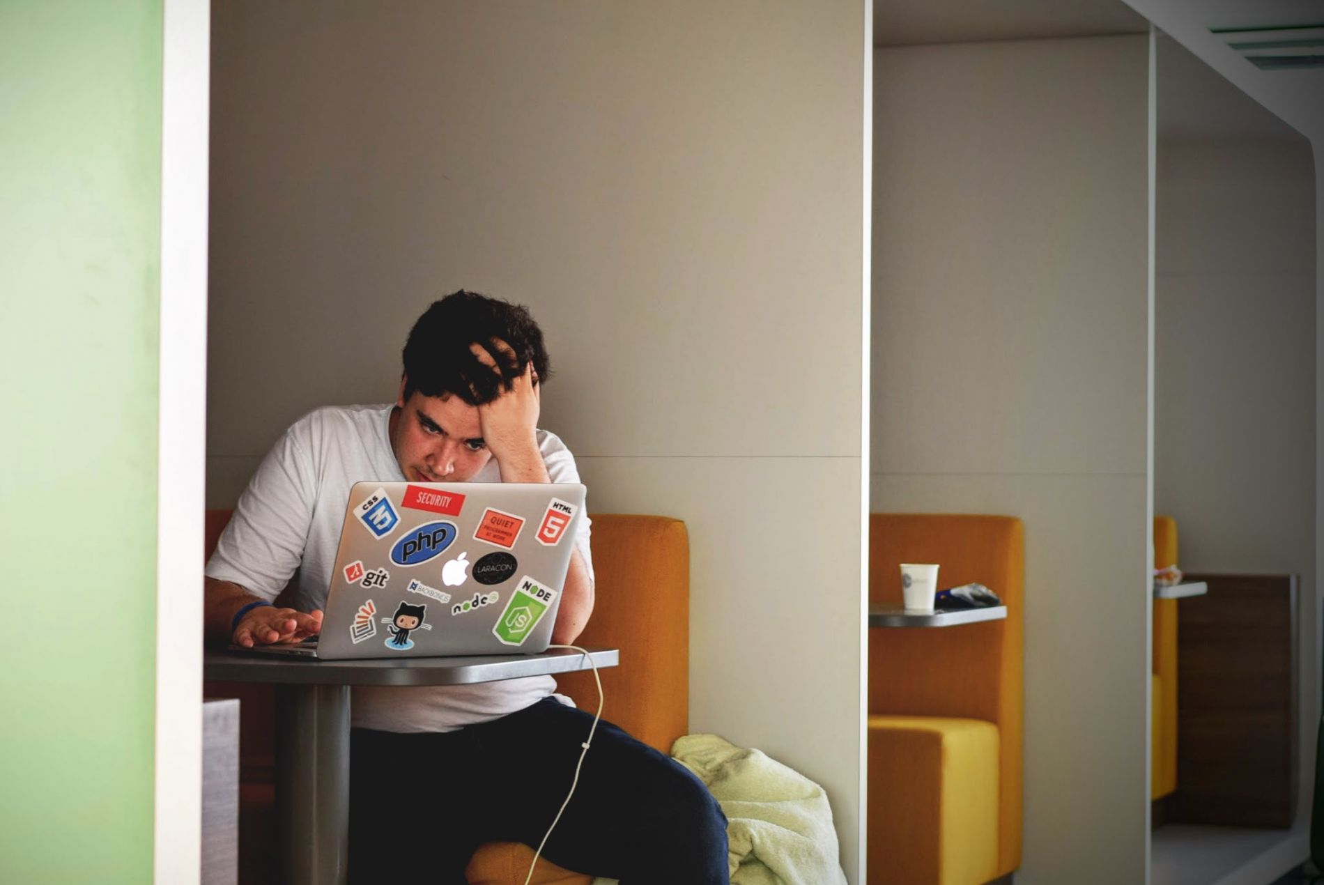 Student on Macbook by Tim Gouw