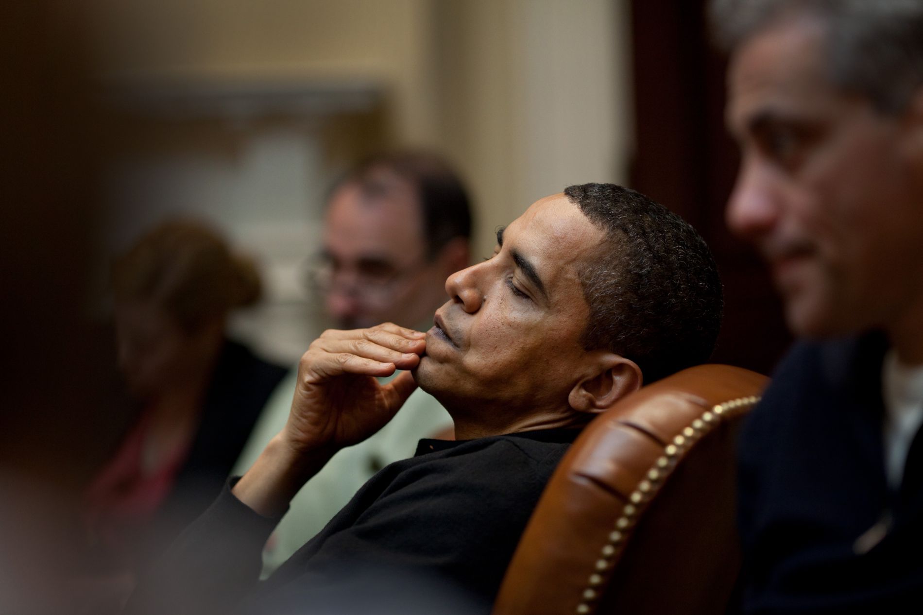 Barack Obama reflects during an economic meeting with advisors in the Roosevelt Room on March 15, 2009.