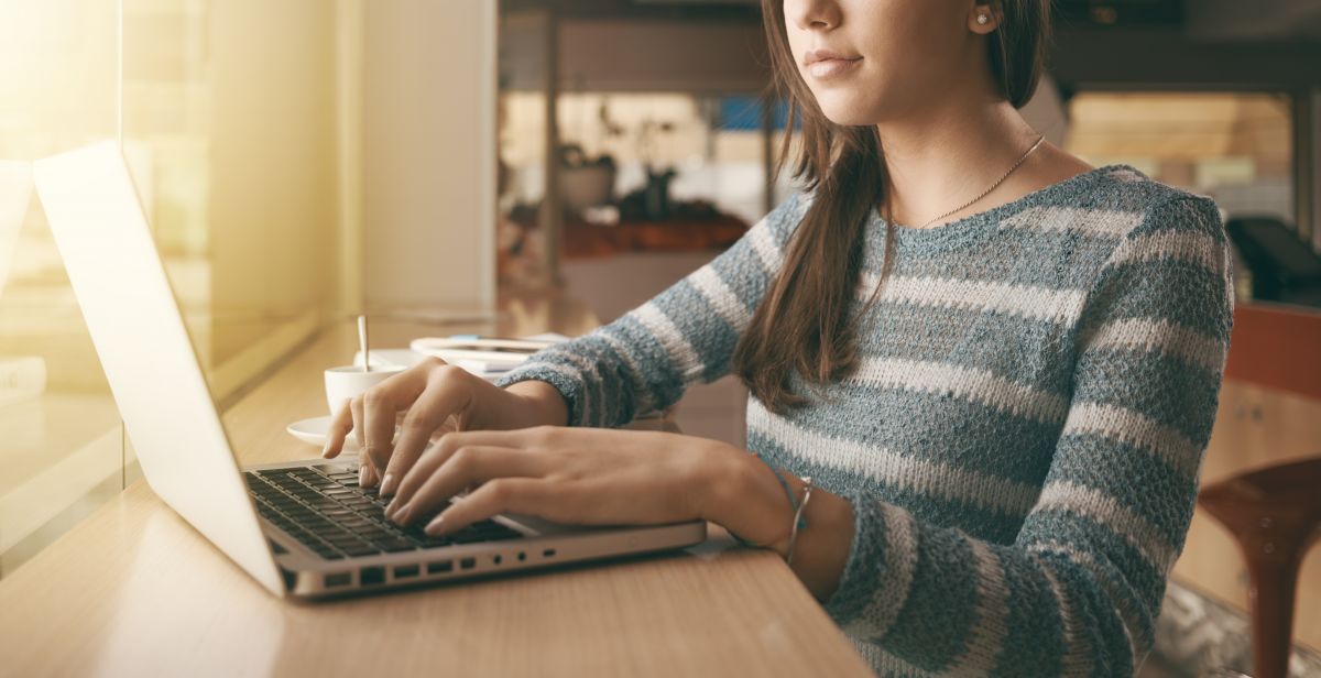 Busy Woman Using A Laptop