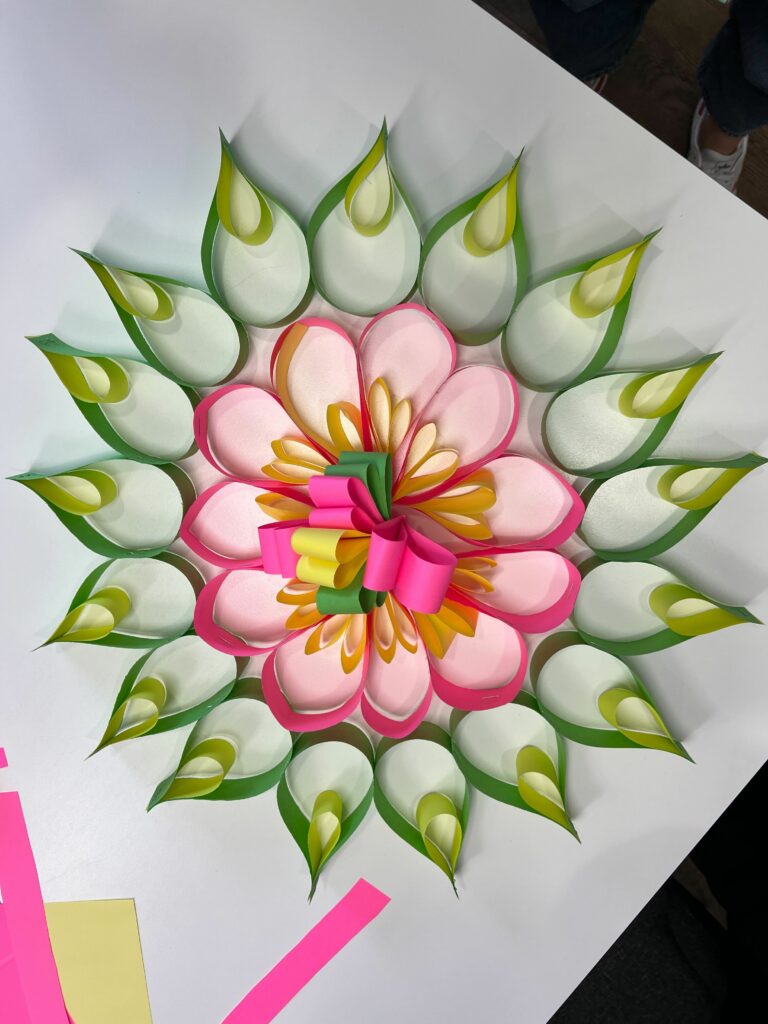 A picture of a a paper rangoli created by JBi digital's team